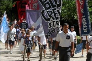 Crew Coach Leads the Parade on Crew Day