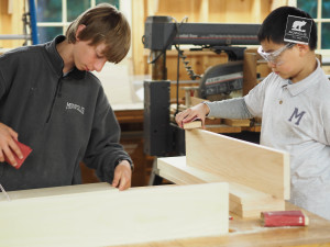 Campers learn how to make toolboxes in the new Wood Shop 