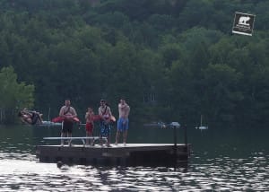 Campers and staff members enjoy evening soak on Newfound Lake