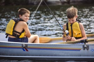 Boys Fishing on the Lake at Camp Mowglis