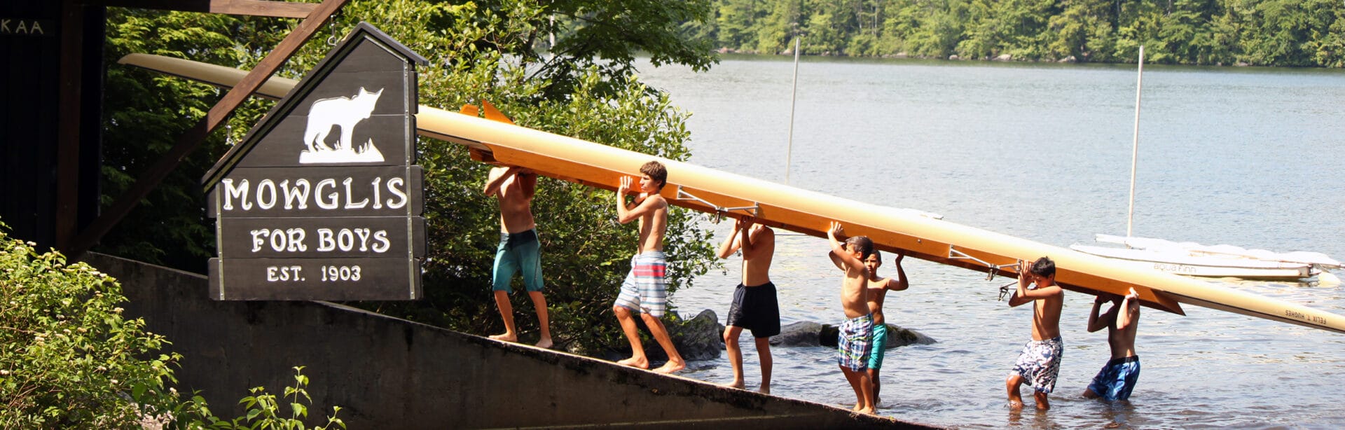 Boys learn teamwork at Camp Mowglis on Newfound Lake, NH