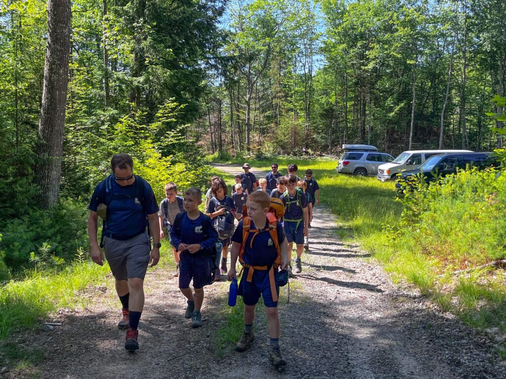 Camp Mowglis boys on a hiking and canoe trip in New Hampshire